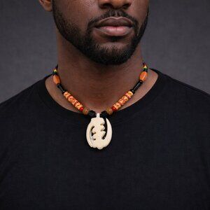 Artisan Black and Cream Beaded Necklace with Tribal Pendant